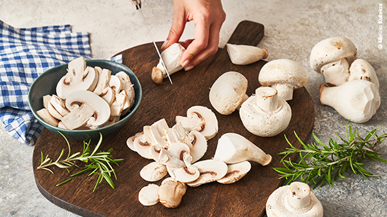 hand brett champignons