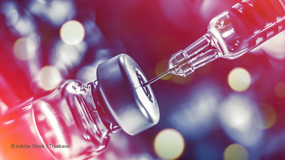 Impfdose mit Spritze